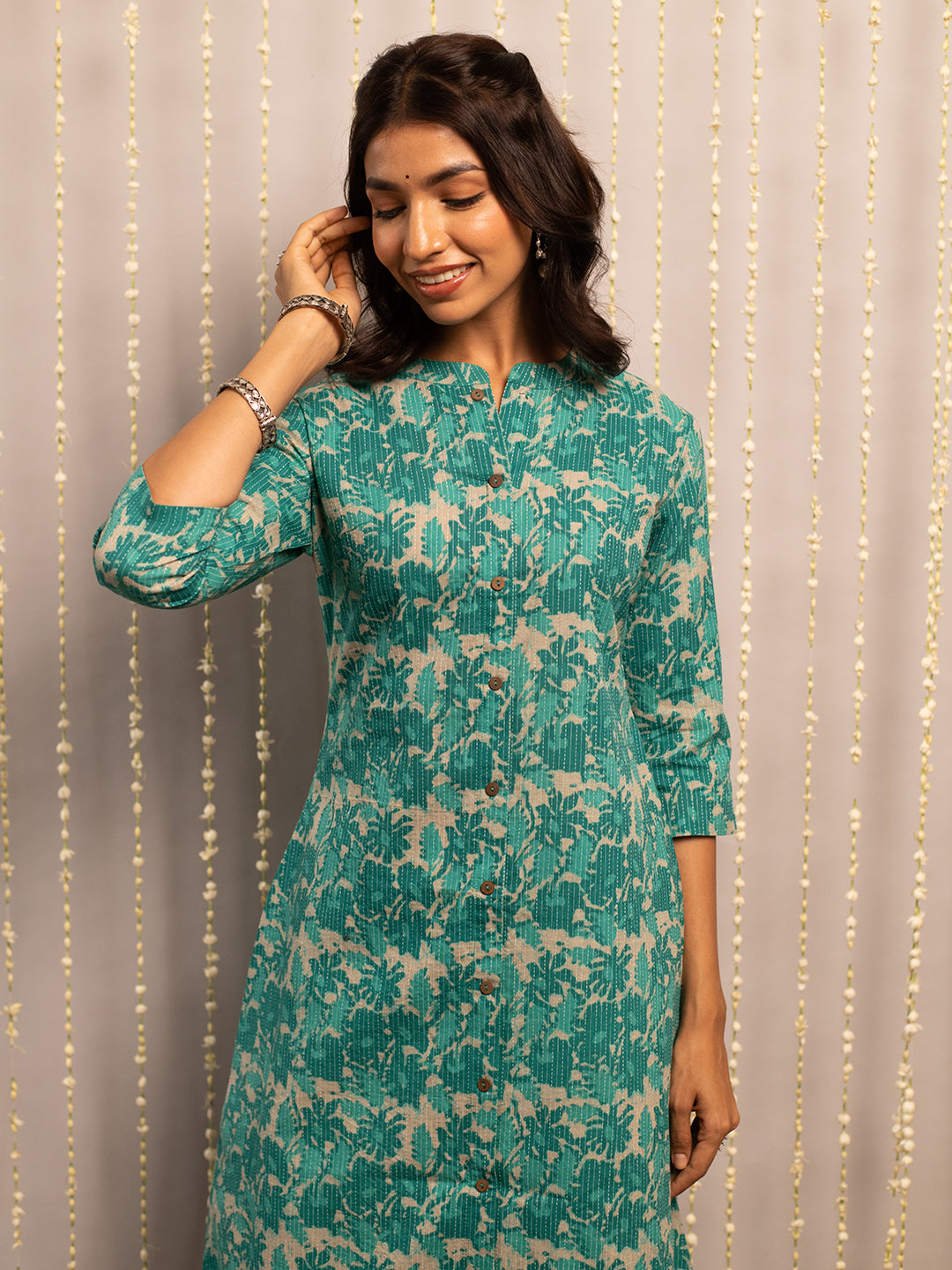 FIORRA Women's Floral Printed Teal Green Cotton A-Line Kurta
