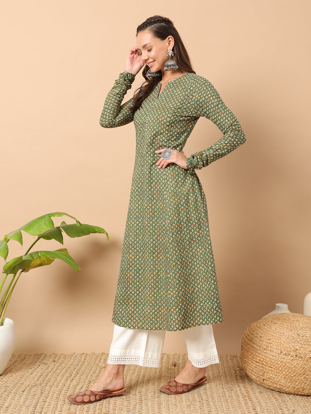 FIORRA Women's Floral Printed Green Cotton A-Line Kurta