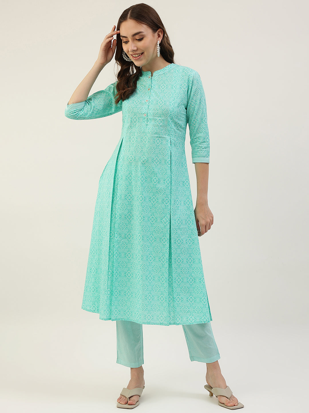 FIORRA Women's Turquoise A-Line Cotton Kurta with Pant