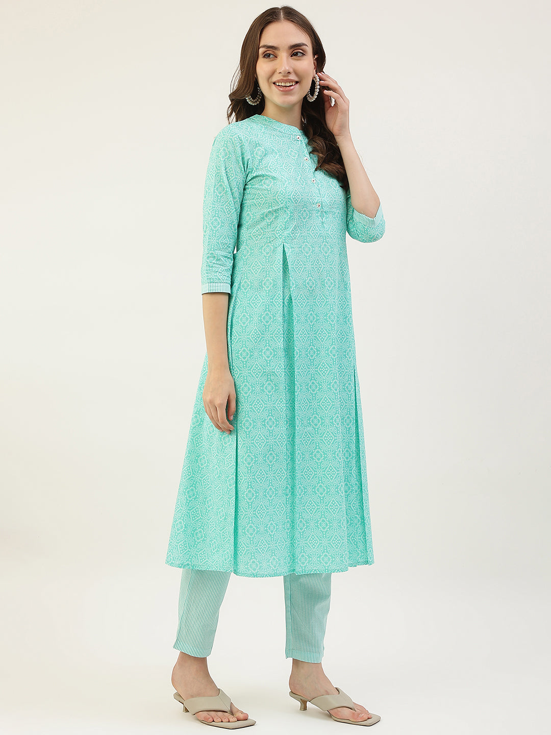 FIORRA Women's Turquoise A-Line Cotton Kurta with Pant