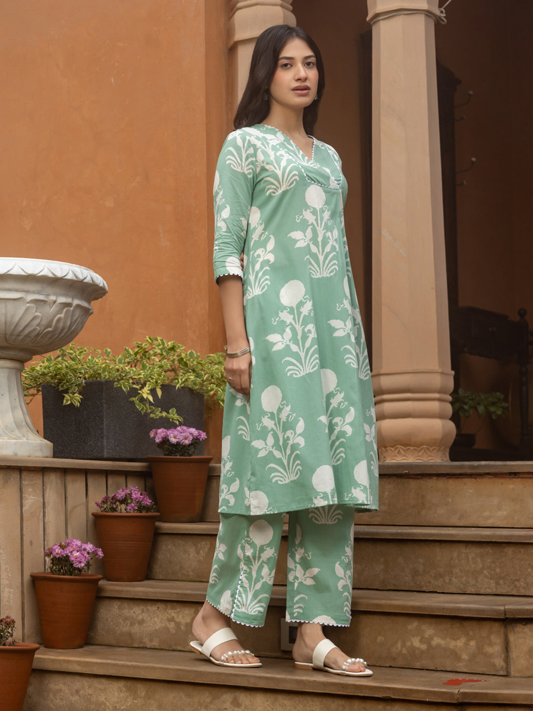 FIORRA Women's Pista Green Cotton Flared Kurta Set